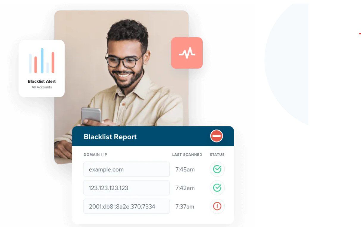 young afro-american man holding phone