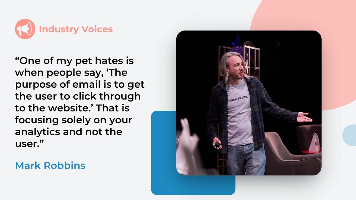 Mark Robbins speaks in front of a crowd wearing a t-shirt that says "Email is Life." Mark Robbins wants marketers to consider accessibility and usefulness and not just click through.