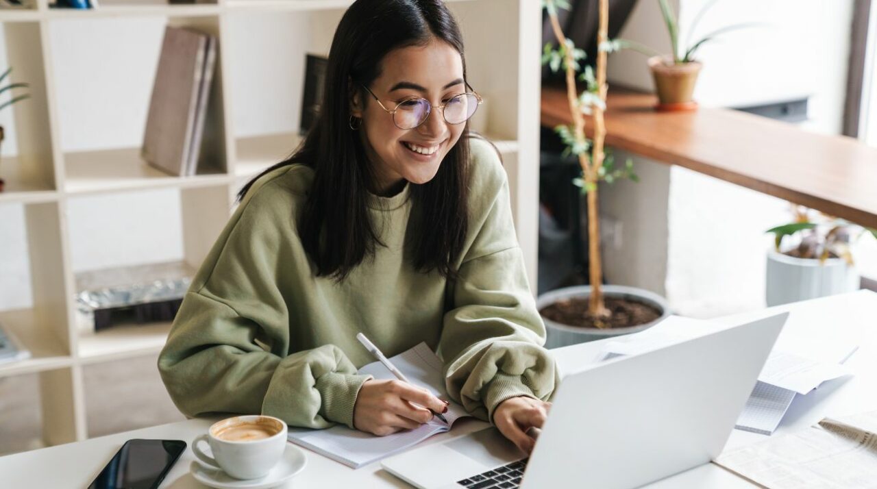 young woman working on computer learning about email branding