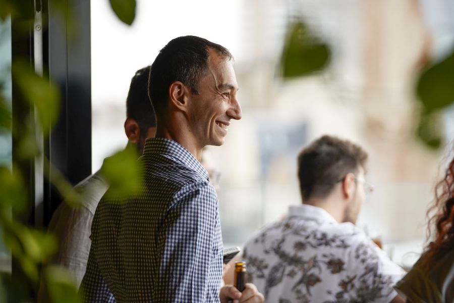 Ciprian Vlad of ZeroBounce smiling in a candid shot at a company team building event