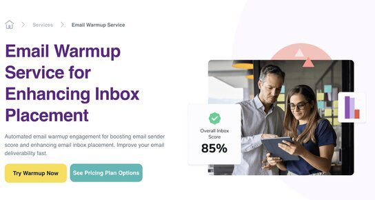 Screenshort of ZeroBounce's email warmup service with two colleagues working together on tablet