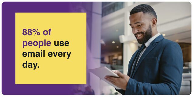 Bearded man looks at laptop considering that 88% of people use email everyday.