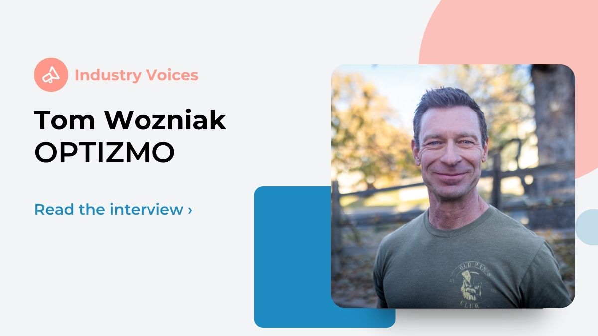 Tom Wozniak smiles outside amidst pastel shape elements while thinking about email sustainability.